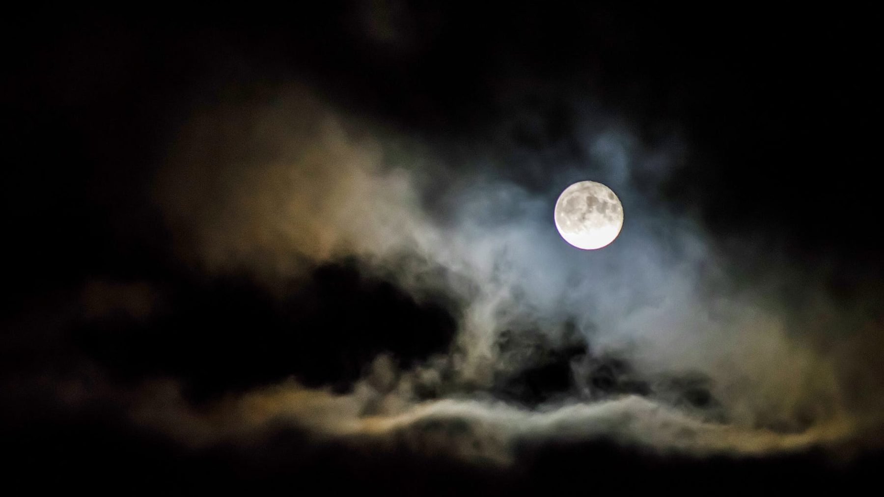 clouds under full moon