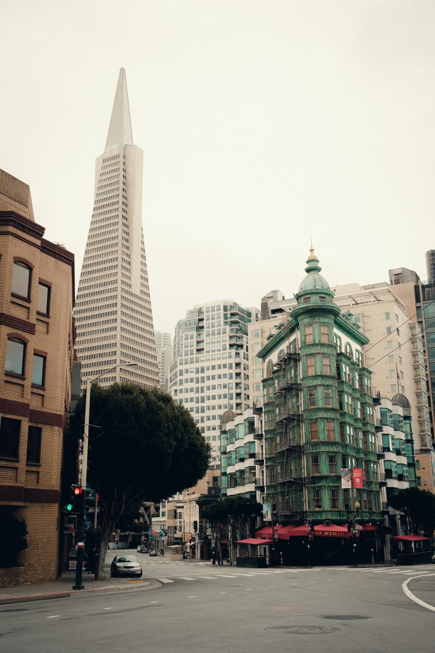 street in san francisco with the transamerica pyramid in the background